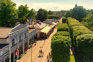 81117174 - pedestrians walk around jomas street in jurmala, latvia. the jomas street is the central and oldest street of jurmala with restaurants, hotels and cafes.